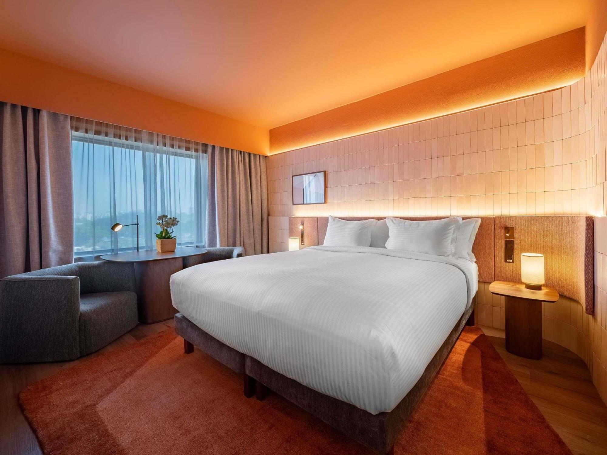 Quarto executivo premium com vista da cidade