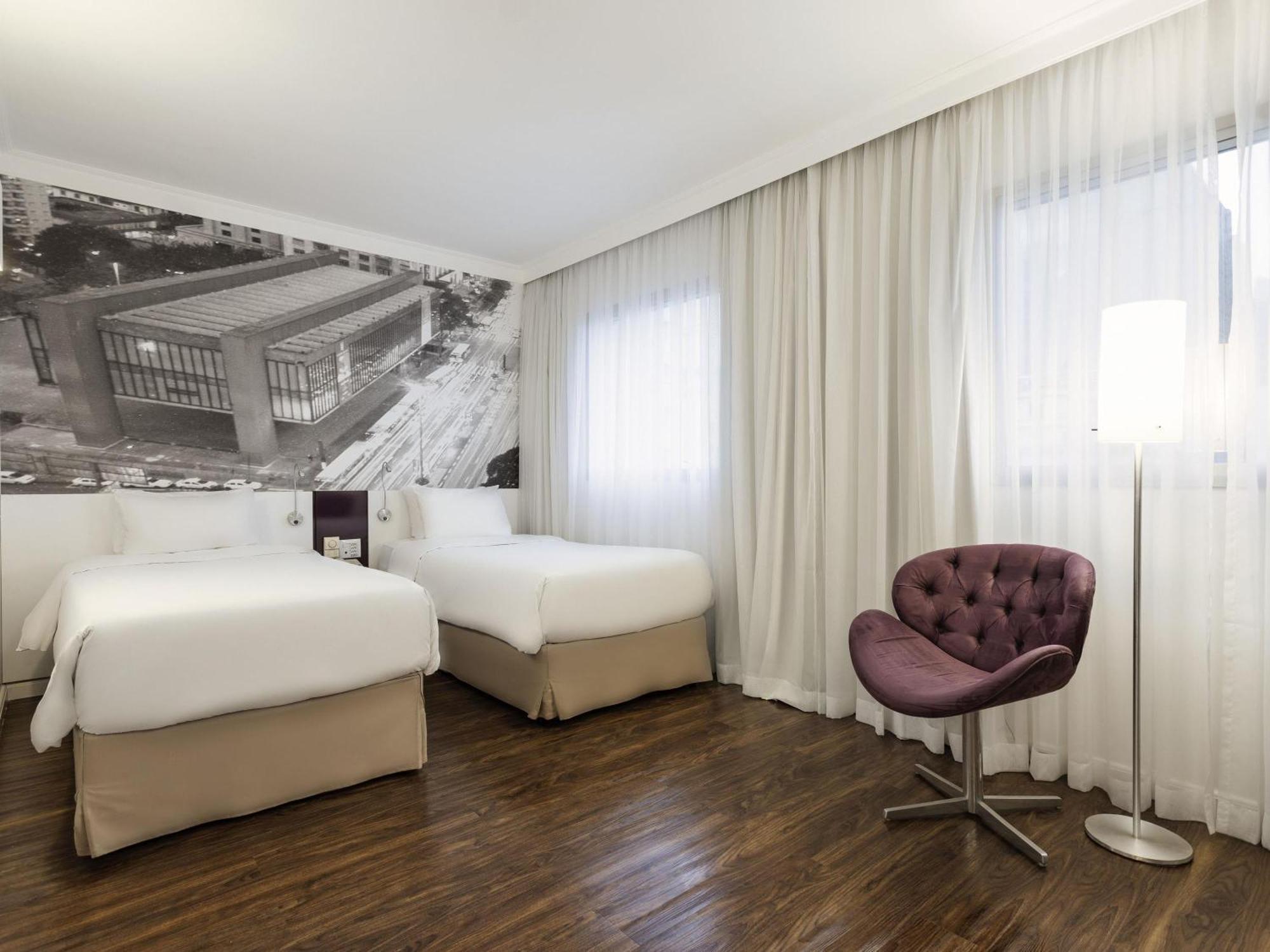 Quarto Superior com 2 Camas de Solteiro e Varanda
